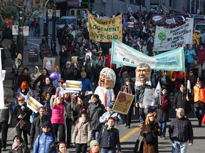 Many thousands marched through the streets towards Square Victoria at an anti-austerity march in downtown Montreal, Friday Oct. 31, 2014.  (Vincenzo D'Alto / Montreal Gazette)