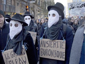 The mood was festive as people dressed up for Halloween at an anti-austerity march in downtown Montreal on Friday
