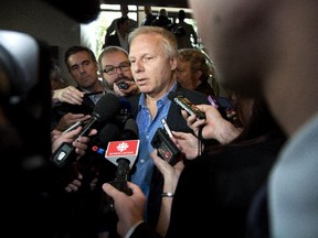 In this file picture from Oct. 4, Jean-François Lisée, PQ MNA for Rosemont, addresses media at the PQ meeting of the presidents council in Sherbrooke.  Lisée seems poised to become the centre of attention again with the publication of a book detailing the back story on the short-lived PQ government of Pauline Marois (Vincenzo D'Alto / THE GAZETTE)