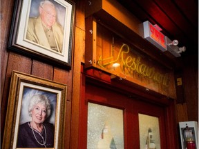 Portraits of Yves and Lilianne Magnon adorn the walls of Magnan Taverne in Montreal on Tuesday October 7, 2014. Yves and Lilianne Magnon were the second generation of the family to run the Taverne. The Magnan family announced they will close the 82-year-old Montreal landmark.