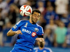 The Impact's Dilly Duka heads the ball during MLS game against the Los Angeles Galaxy at Montreal's Saputo Stadium on Sept. 10, 2014.
