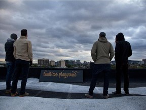 Local street art group Garbage Beauty with a spontaneous creation on the rooftop of a building in Montreal.