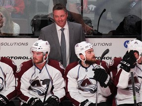 Avalanche coach Patrick Roy smiles during NHL pre-season game against the Canadiens at the Bell Centre on Sept. 25, 2014.