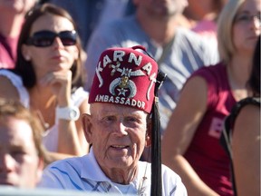A Shriners member watches the 27th annual Shrine Bowl football game between the McGill Redmen and Concordia Stingers on Sept. 28, 2013. McGill won the game 53-52 in overtime.