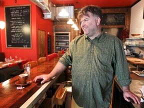 Chef-owner David Ferguson, relaxes in Gus, his restaurant in Montreal's Beaubien/St-Laurent neighbourhood on Sept. 30, 2014.