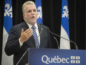 Premier of Quebec Philippe Couillard speaks during a press conference  in Montreal, on Tuesday, September 30, 2014.
