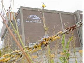 A locked chain bars the entrance to the Hippodrome de Montréal in Montreal, Wednesday, Oct.1, 2014.