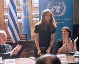 British Actor and UN Women Goodwill Ambassador Emma Watson (C) speaks next to Uruguay's Vice President Danilo Astori (L) and the Director of the UN Women Programme Division Gulden Turkoz-Cosslett (R) during the presentation of the UN Womens HeForShe campaign to Non Governmental Organizations at the Uruguay's Parliament in Montevideo on September 17, 2014.