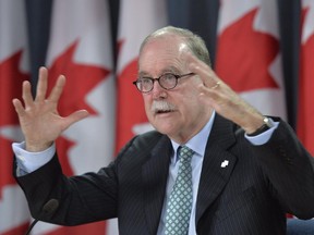 Official Languages commissioner Graham Fraser releases findings from his 2013-14 annual report at a news conference in Ottawa on Tuesday, Oct. 7, 2014.