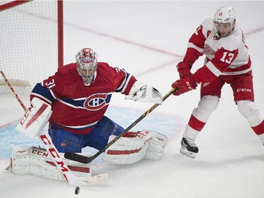 Montreal Canadiens goalie Carey Price makes a save against Detroit Red Wings' Pavel Datsyuk during second period NHL hockey action in Montreal, Tuesday, October 21, 2104.