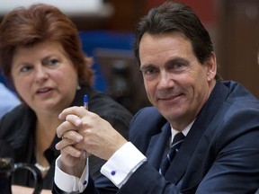 Pierre-Karl Péladeau and colleague Nicole Léger at the beginning of a party caucus meeting in September at the legislature in Quebec City.