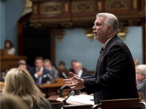 Quebec Premier Philippe Couillard speaks during question period Wednesday, October 8, 2014 at the legislature in Quebec City.