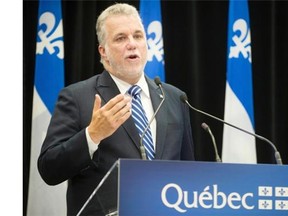 Premier of Quebec Philippe Couillard speaks during a press conference at the Palais des congres de Montreal on Tuesday, September 30, 2014.