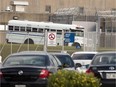 Public Security buses wait at outside the prison Thursday, July 22, 2010 at the Orsainville detention centre in Quebec City.