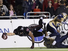 Redblacks receiver Scott MacDonell drives toward the end zone against the Winnipeg Blue Bombers during CFL action in Ottawa on Oct. 3, 2014.