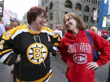 Sisters Darlene Steves, left, and Suzanne Pearson are at odds at tailgate outside the Bell Centre prior to the Habs home opener in Montreal Thurssday October 16, 2014.  Pearson now lives in Saskatchewan.