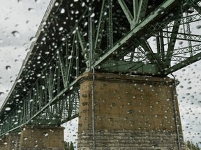 Rain hits a car windshield under the Champlain Bridge in January 2009.