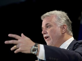 Quebec Premier Philippe Couillard speaks at a new conference Sept. 29, 2014.