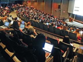 Students attend a lecture in the Leacock Building at McGill University in Montreal, Tuesday Feb. 25, 2014.