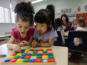 FILE — Pre-kindergarten students from the Commission scolaire de Montréal in a class at St. Dorothy's school in Montreal Thursday, October 16, 2014.