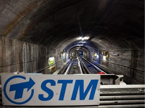 The Societe de transport de Montreal (STM) logo on a service vehicle inside the tunnels of the Metro's blue-line during the STM's overnight overnight work shift in Montreal on Friday, January 28, 2011. The transit authority says the 40-year-old metro cars used on this and the Orange line can be kept in service for another 20 years. (Dario Ayala/THE GAZETTE)