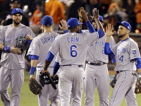 The Kansas City Royals celebrate after their 3-2 win over the San Francisco Giants in Game 3 of baseball's World Series, Friday, Oct. 24, 2014, in San Francisco. The Royals lead the series 2-1.