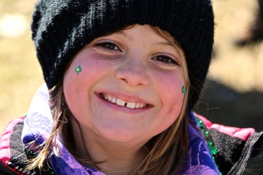 Thea, at the parade for Saint Patrick's Day, I think she's happy !