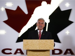 Tom Renney speaks at a news conference as the new head of Hockey Canada in Calgary on July 15, 2014.