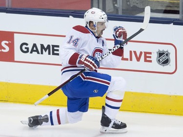 Montreal Canadiens' Tomas Plekanec celebrates a goal during second period NHL action against the Toronto Maple Leafs in Toronto on Wednesday, October 8, 2014.