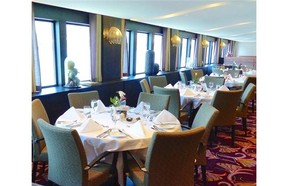 Ama Sonata dining room on AmaWaterways. All river cruise lines are establishing their niche in a unique way.