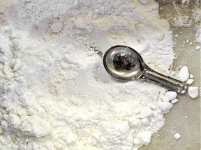 A tub of potassium gluconate is seen on a production table at the Soylent corporate office in Oakland, California on September 09, 2013.