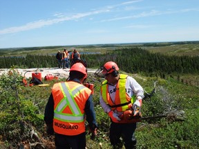 Workers begin the long process of building a 48- kilometre road that will link Unamen Shipu to the outside world on Tuesday, July 5, 2013.