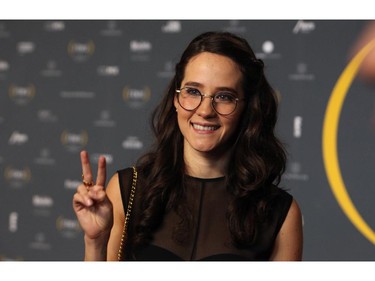 Mexican singer Ximena Sariñana poses for photographers during her red carpet walk during the Fenix Iberoamerican Film Awards at the Esperanza Iris Theater in Mexico City, Thursday Oct. 30, 2014.