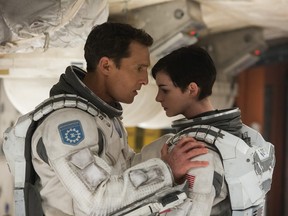 This photo released by Paramount Pictures shows, Matthew McConaughey, left, and Anne Hathaway, in a scene from the film, '"Interstellar," from Paramount Pictures and Warner Brothers Pictures, in association with Legendary Pictures. (AP Photo/Paramount Pictures, Melinda Sue Gordon)