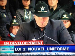 The Police Brotherhood unveils new Châteauguay uniforms as part of their protest against Bill 3, on Friday, Nov. 14, 2014.