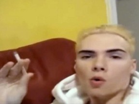 An image grab taken on June 6, 2012 from a video uploaded on YouTube shows Luka Rocco Magnotta, a porn actor dubbed the "Canadian Psycho" for allegedly killing and chopping up his lover, posing in Berlin on June 3. Police in Berlin picked up Magnotta, 29, at an Internet cafe on June 4 after a days-long global hunt for the man believed to have murdered his Chinese lover with an ice pick, dismembered his body and filmed the grisly killing.