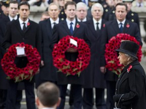 Britain's Queen Elizabeth II leads the Remembrance Sunday ceremony at the Cenotaph on Whitehall, London, on Nov. 9, 2014. Services are held annually across Commonwealth countries during Remembrance Day to commemorate servicemen and women who have fallen in the line of duty since World War I.