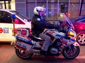 Montreal police are wearing casual pants as part of pension reform protests. This motorcycle cop was photographed in November 2014.