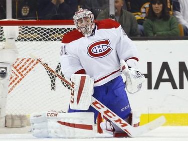 Montreal Canadiens goalie Carey Price makes a save against the Boston Bruins during the first period of a 2-0 win in an NHL hockey game in Boston, Saturday, Nov. 22, 2014.