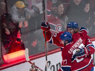 Montreal Canadiens' Dale Weise, right, celebrates his first goal against the Philadelphia Flyers with teammate Alex Galchenyuk during third period NHL hockey action Saturday, November 15, 2014 in Montreal. The Canadiens beat the Flyers 6-3.