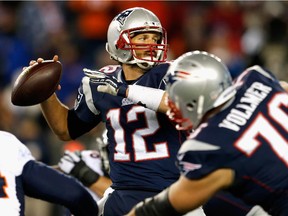 Tom Brady of the New England Patriots passes the ball during the second quarter against the Denver Broncos at Gillette Stadium on November 2, 2014 in Foxboro, Massachusetts.