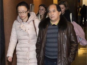 Diran Lin, father of Jun Lin leaves the courtroom at the murder trial for Luka Rocco Magnotta Tuesday, Nov. 25, 2014 in Montreal. Magnotta is charged in connection with the death and dismemberment of university student Jun Lin.