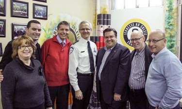 Decision makers gathered at Sun Youth's 2013 Christmas basket distribution: MNA and Vice-President of the National Assembly Carole Poirier, Sun Youth Director of Crime Prevention Helio Galego, Montreal Executive Committee President Pierre Desrochers, Montreal Police Chief Marc Parent, Mayor of Montreal Denis Coderre, Sun Youth Executive Vice-President Sid Stevens and Assistant Executive Vice-President Tommy Kulczyk.