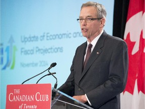 Federal Finance Minister Joe Oliver delivers the Update of Economic and Fiscal Projections in Toronto on Wednesday, Nov. 12, 2014.