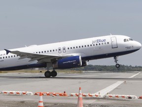 A JetBlue airplane take off from John F. Kennedy International Airport in New York.