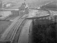 This Nov. 19, 1961,file photo shows a view from top of the old Reichstag's building to the Brandenburg Gate, which marks the border in this divided city. The semi-circled wall around the Brandenburg Gate was erected by East German police.