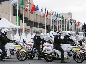 Police officers are seen at the car entrance of the Brisbane Convention and Exhibition Centre on November 12, 2014 in Brisbane, Australia. World economic leaders will travel to Brisbane for the G20 Leadership Summit November 15-16.