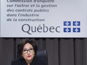Justice France Charbonneau delivers her remarks as she sits on the closing day in Montreal Friday, November 14, 2014 of the Charbonneau Commission, a Quebec inquiry looking into allegations of corruption in the province's construction industry. Among other things, the commission heard testimony about the use of “straw men" to circumvent limits on political donations.