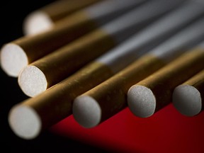 Picture of cigarettes taken on September 25, 2014 in Paris. France unveiled on September 25 a raft of new measures to crackdown on tobacco and electronic cigarettes including the introduction of plain cigarette packaging and the ban on electronic cigarettes in certain public places, in a bid to reduce high smoking rates among the under-16s.