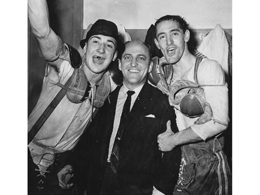 Future Montreal Canadiens defenceman Guy Lapointe (left) celebrates the 1965 Verdun Junior Canadiens' championship with coach Pete Singleton (centre) and an unidentified teammate.